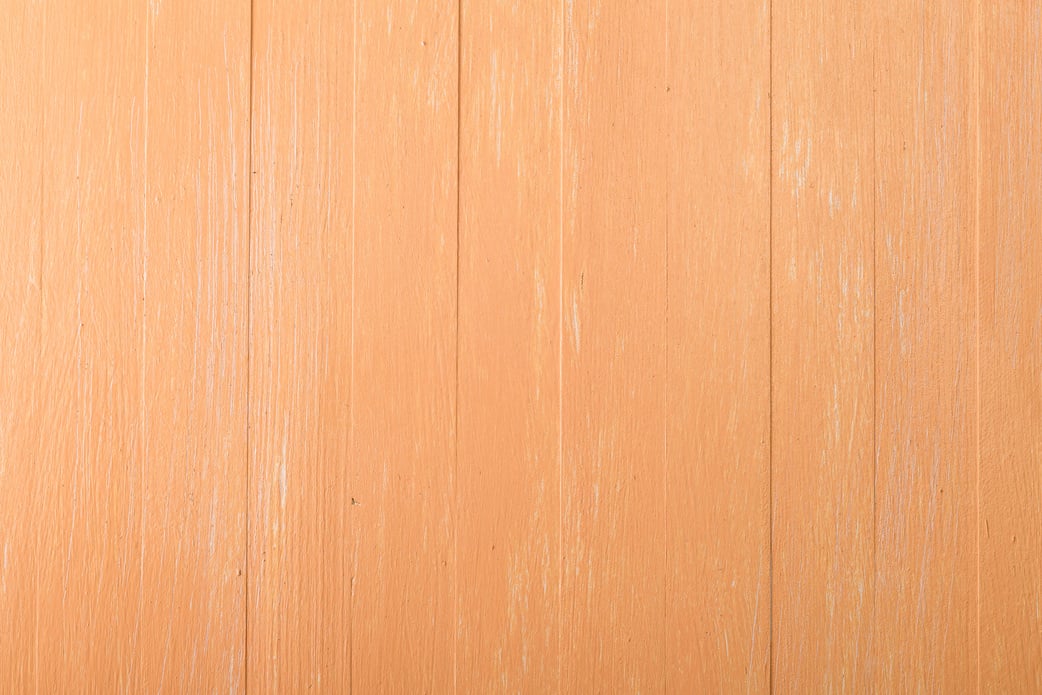 Orange wood background. Wooden board.